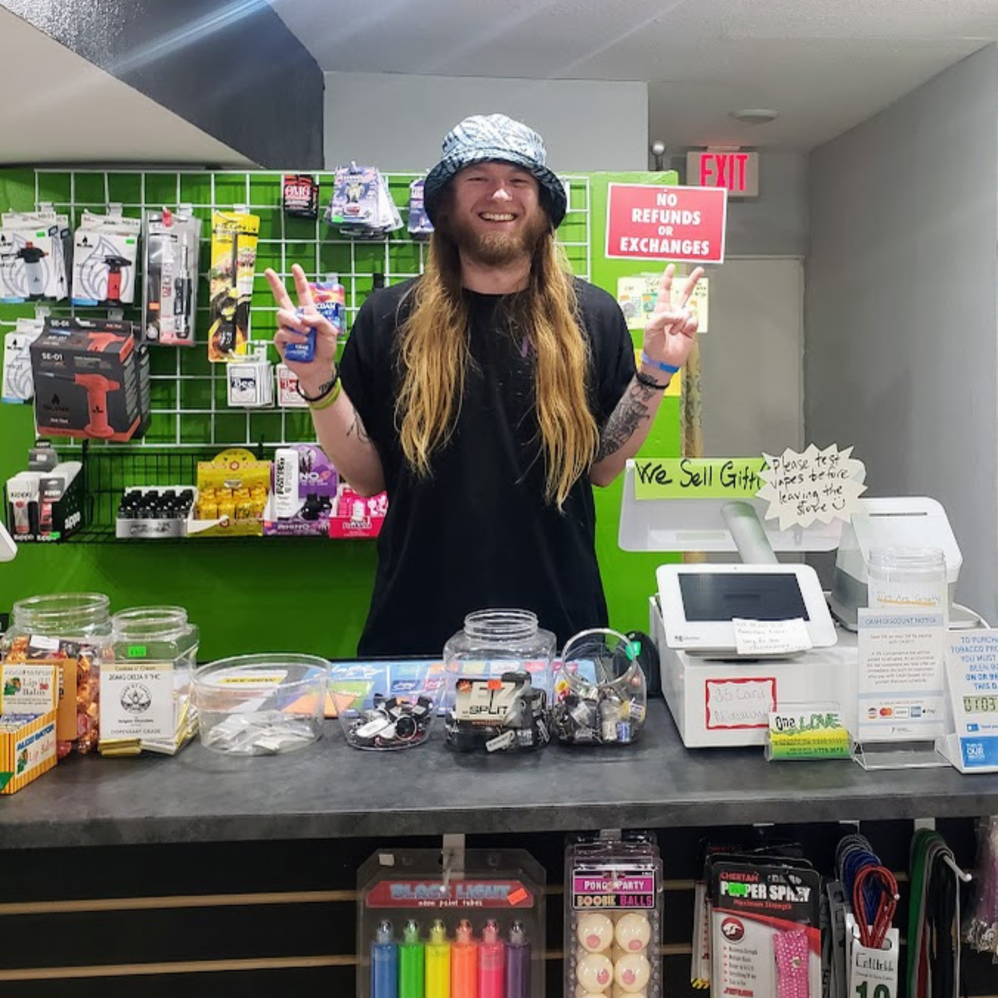 One Love Smoke Shop Employee